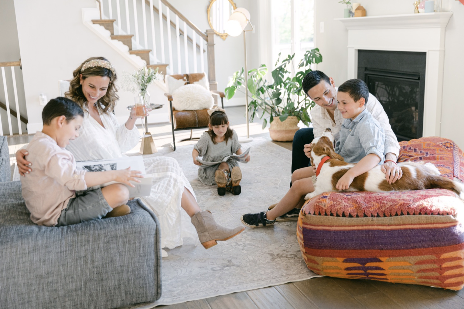 a family sitting in a living room