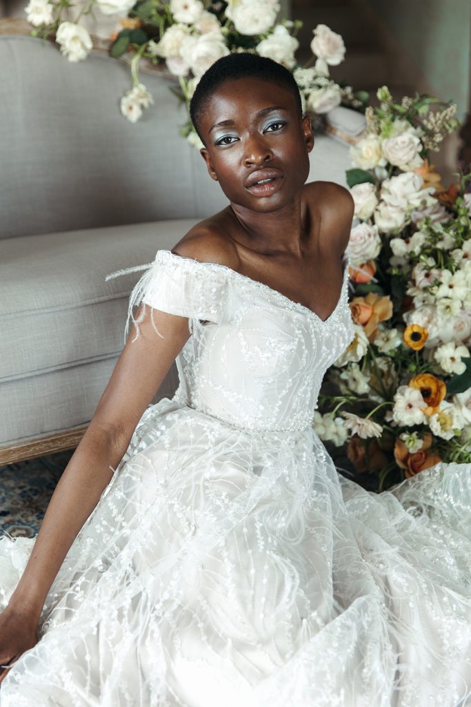 A bride poses during her bridal portraits by Kyla Jeanette Photography