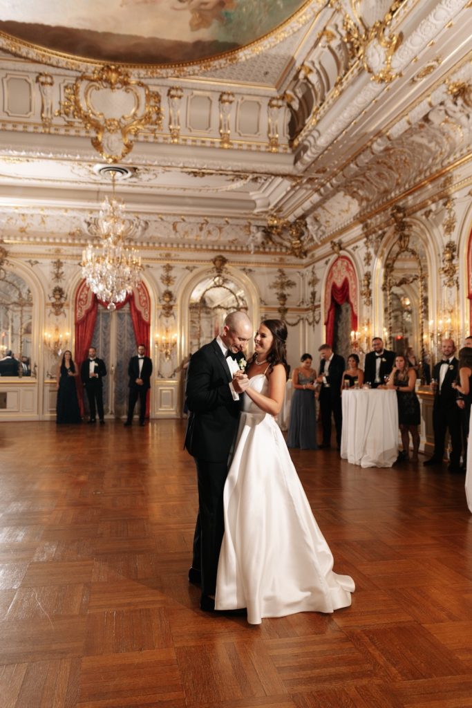 Bride and groom share their first dance at their luxury wedding venue at the Cosmos Club in Washington, D.C.
