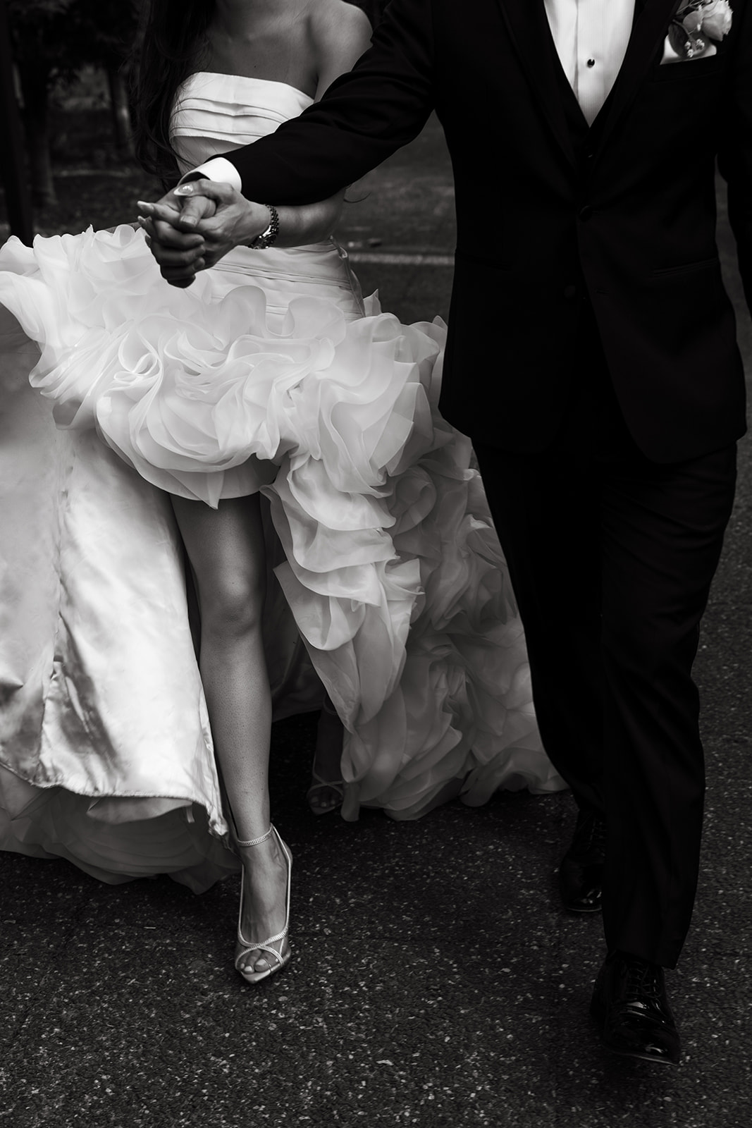 bride and groom are holding hands together in a vintage photo