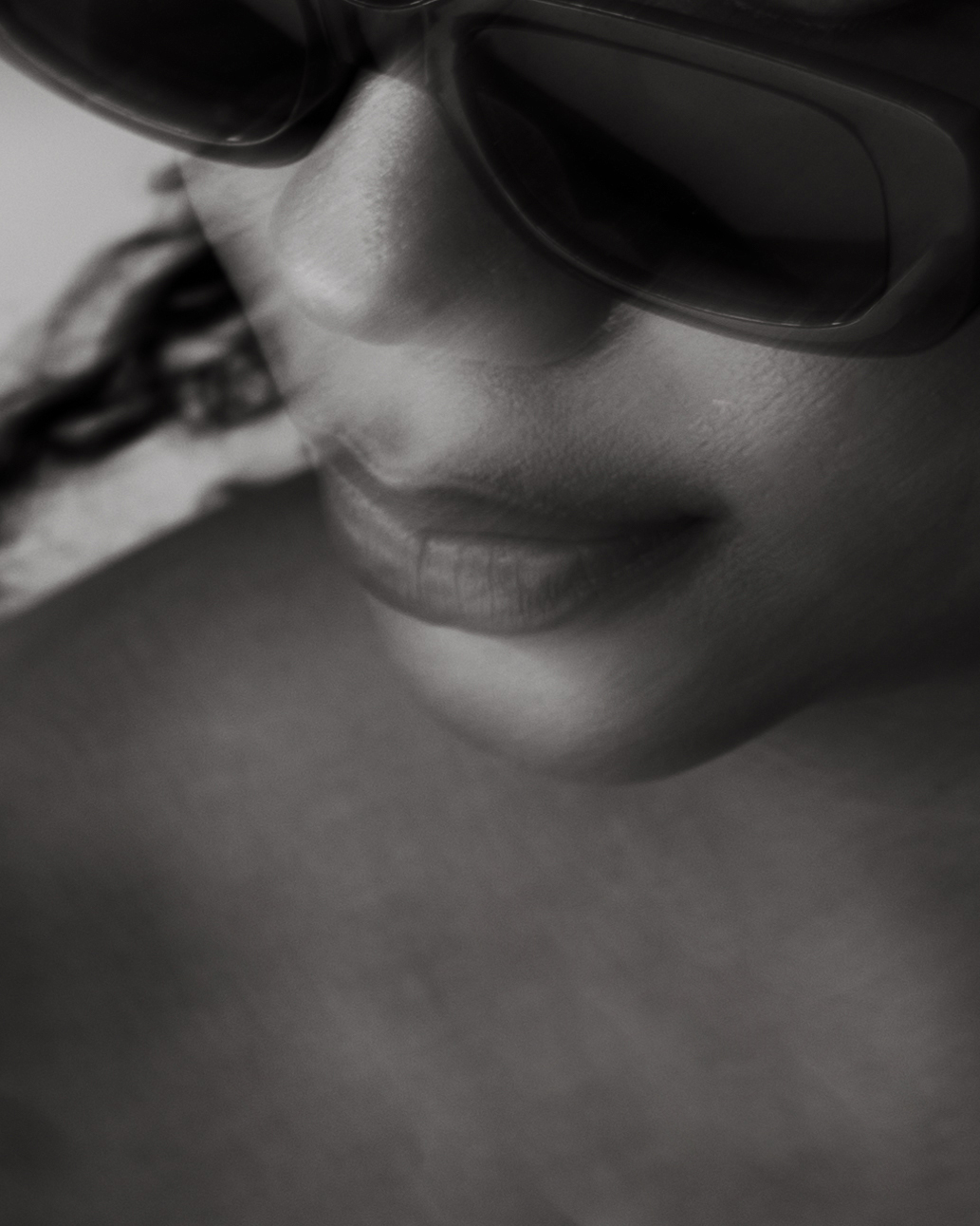 Lauren with a close-up of a wearing sunglasses
